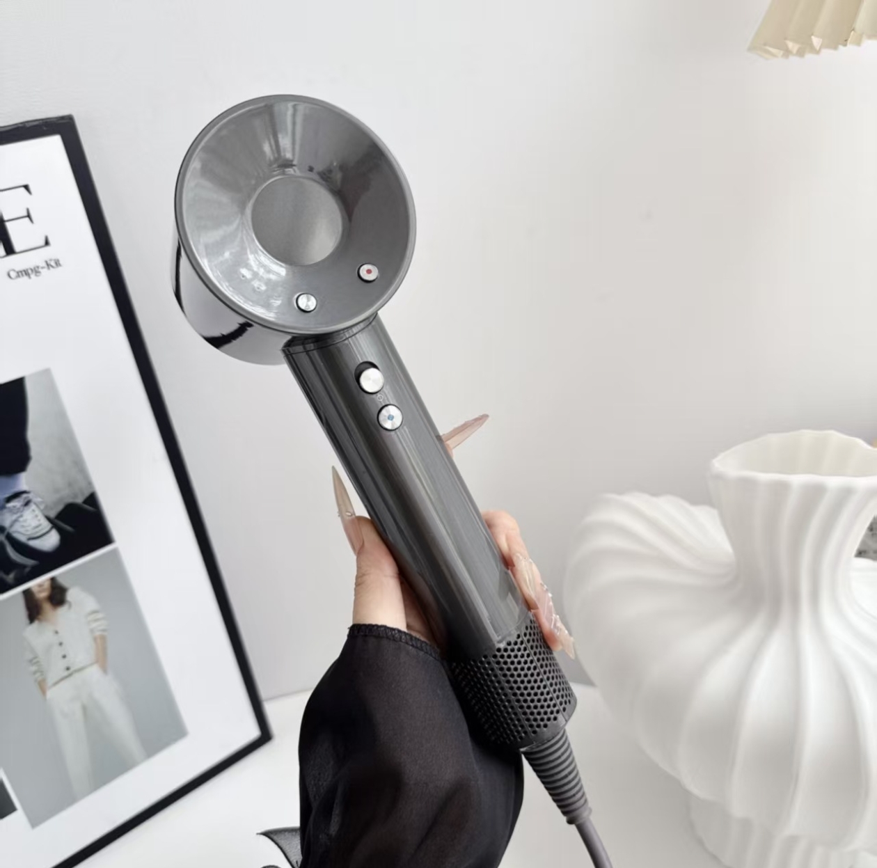 Close-up of a graphite high-speed hair dryer
